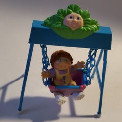 Vintage Small Cabbage Patch Doll Figurine On Swing