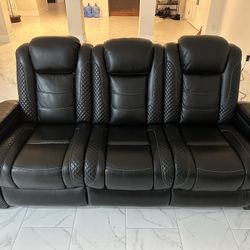 Ashely furniture power reclining black leather sofa