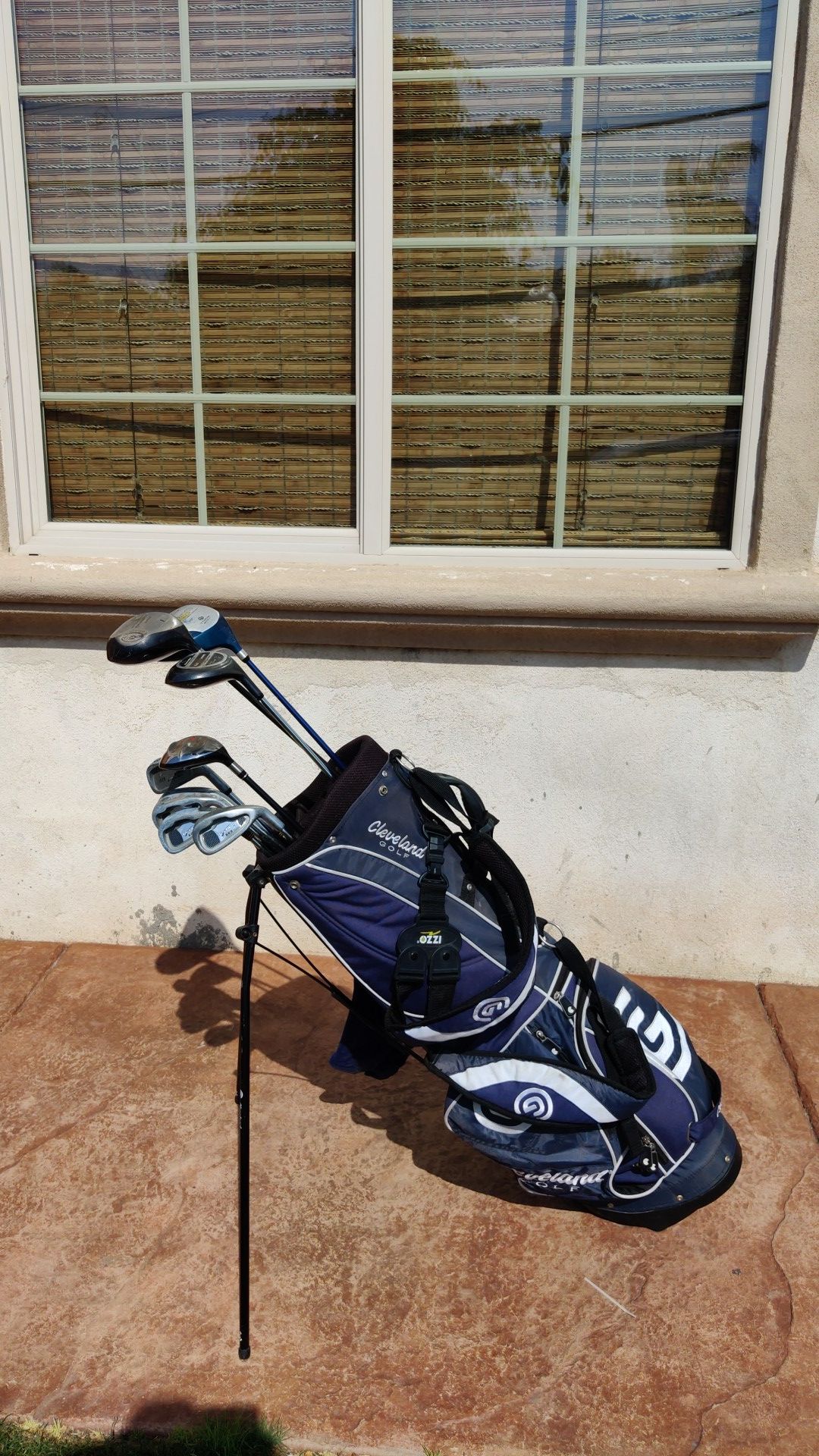 Cleveland Golf bag with old clubs inside. Irons: 3,4,5,6,8,9 3 Wood, 4 wood 2 Drivers