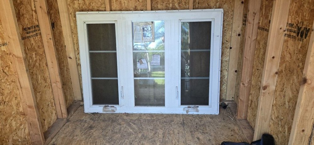 Insulated Screened Crank Out Window