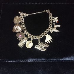 Monet Sterling Silver Bracelet With 9 Sterling Silver Charms