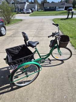 adult tricycle 2 yr old ($300 orig)