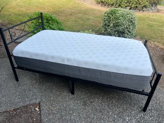 Twin bed setup ready for college.