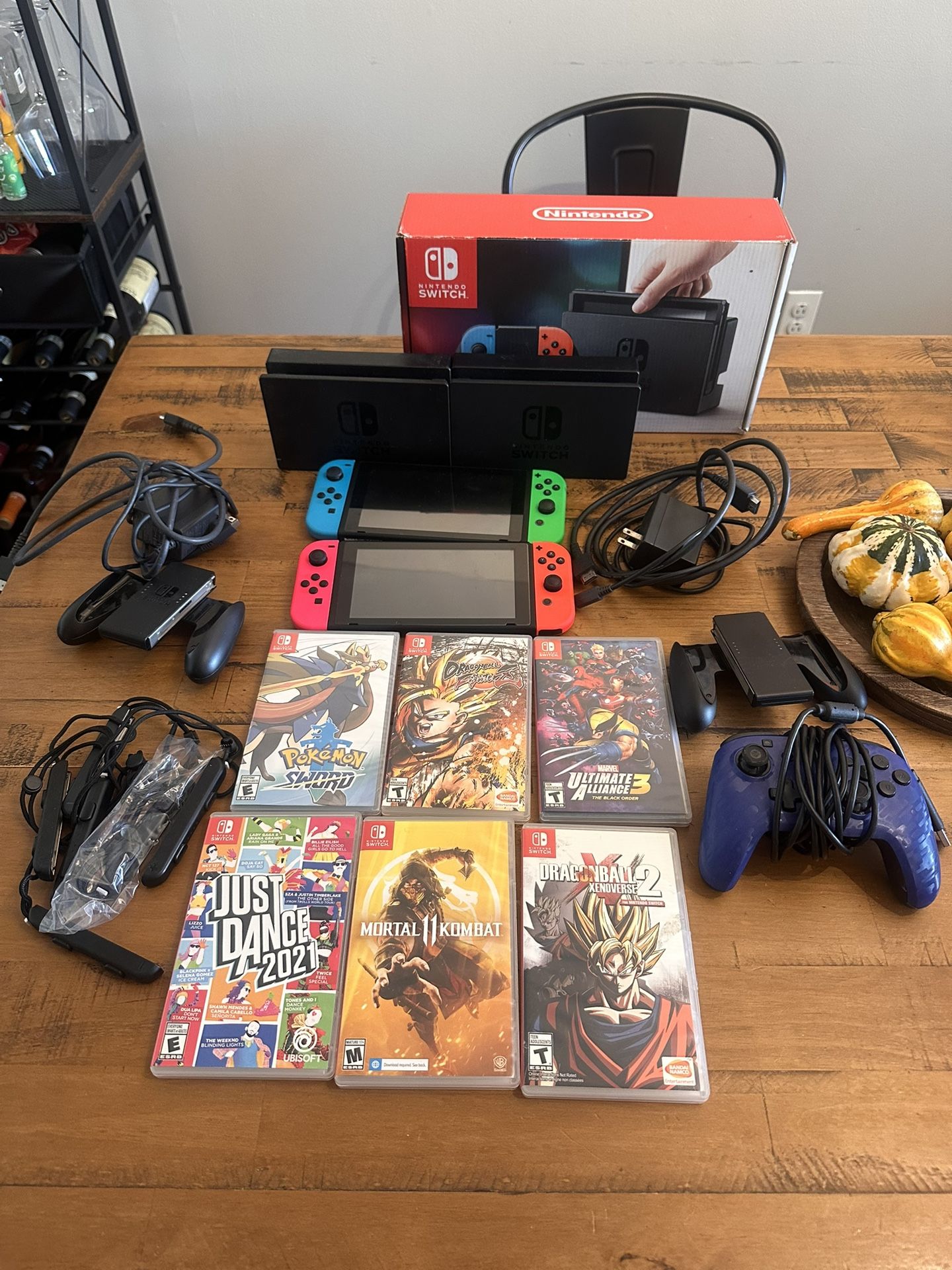 Two Nintendo switch + 6 Games, Including Pokemon Sword
