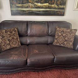 Leather couch and loveseat