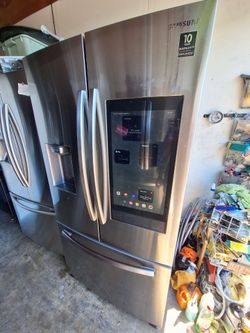 SAMSUNG FAMILY HUB STAINLESS STEEL FRENCH DOOR REFRIGERATOR WITH BUILT-IN TABLET AND SPEAKERS