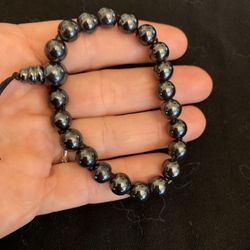  hematite bead stretch bracelet with a simple cord.