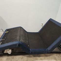 Adjustable bed. Sealy Posturepedic mattress.