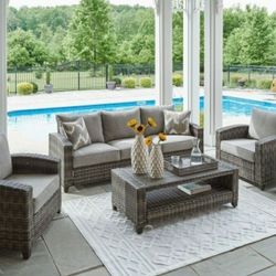 4-Piece Outdoor Wicker Patio Set Sofa, 2 Chairs & Coffee Table!