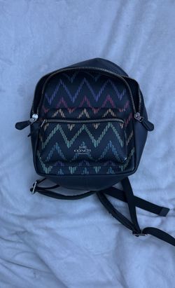 Coach Mini Charlie Backpack with a Geo Chevron Print.