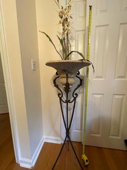 Base iron..  comes with the fake flower