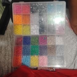 2 Containers Of Beads 