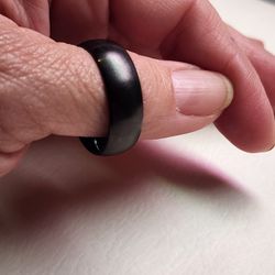 
FOUND - MENS WEDDING BAND!!!

"Tungsten Carbide" Steel Black Large