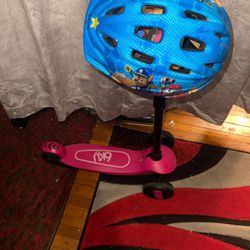 6ku scooter with helmet. In like new condition. The helmet alone goes for $25. Beautiful color and style. Pickup only