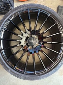 20" Black gloss American Racing rim