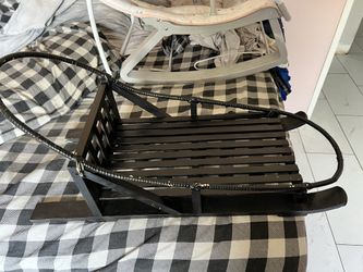 Baby sled for photo shoot