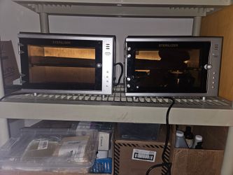 Two Sanitizer cabinets