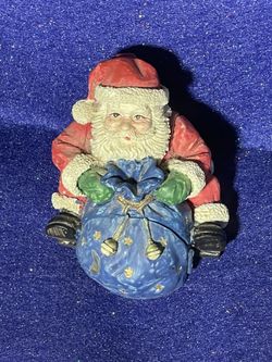 Sitting Santa Opening Toy Bag. (#6)