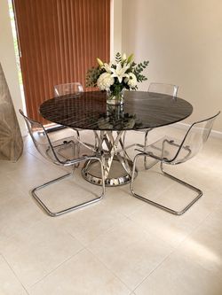 Marble dining table on chrome stand