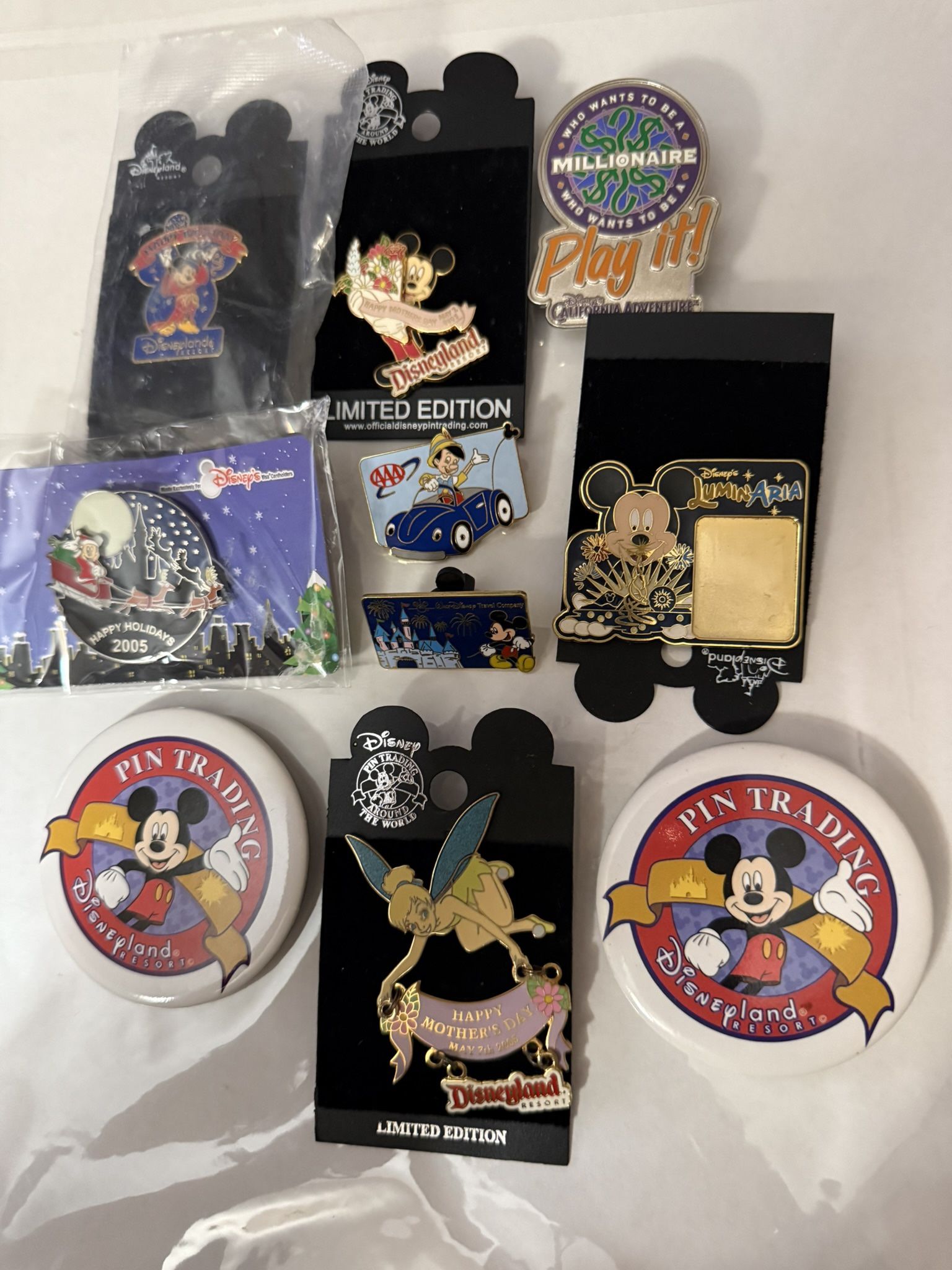 Eight Disney collector pins cast member edition