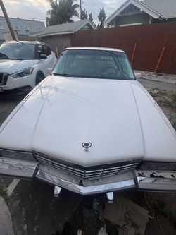 White Cadillac deville 1992