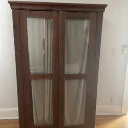 Wood Armoire With Shelves And Clothes Rods