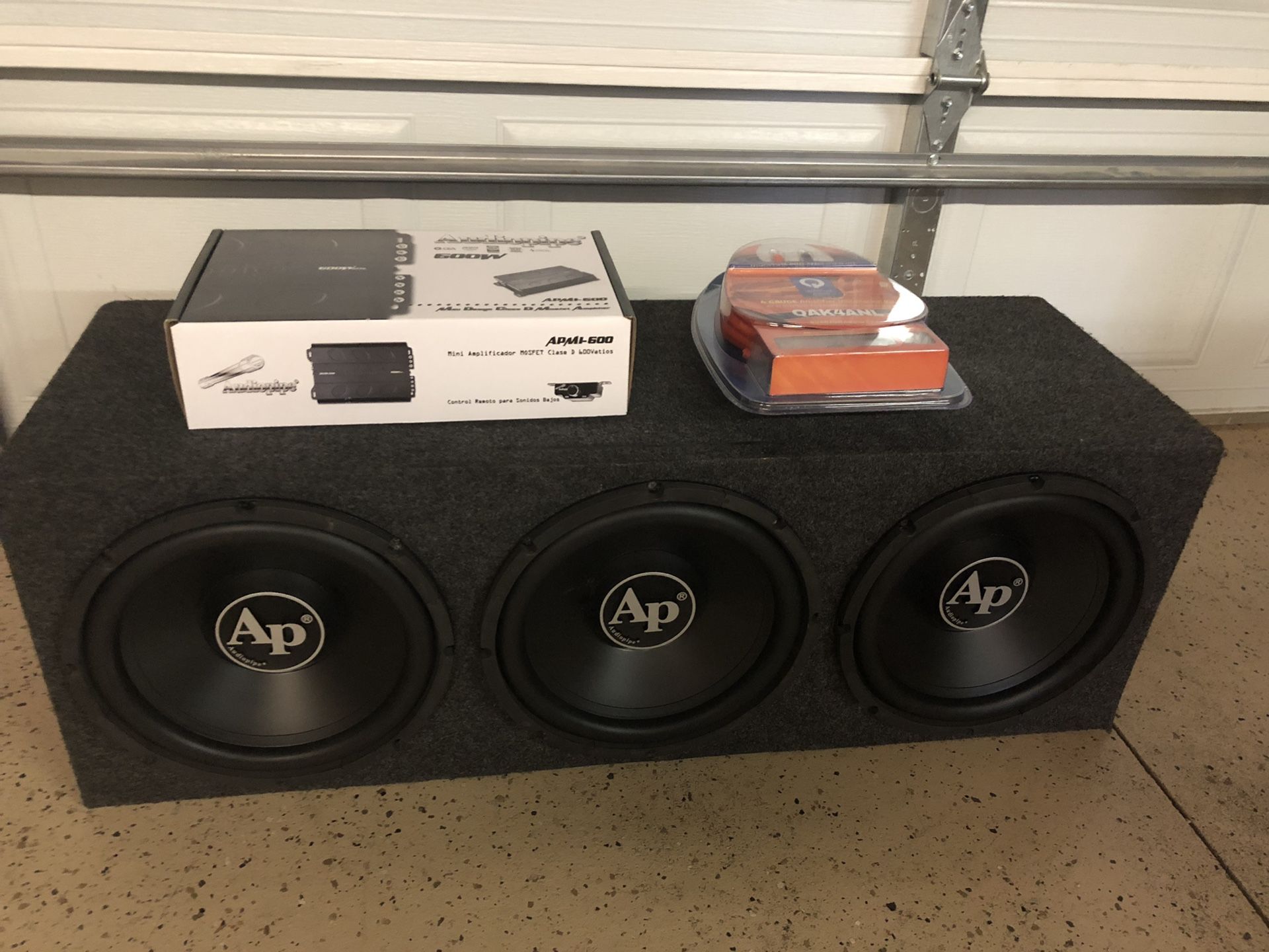 3 12 Audiopipe subs in box with car amp and wires New