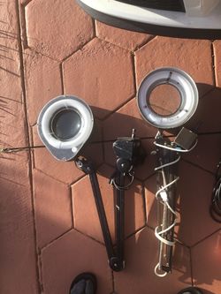 Magnifying lamp with clamp work table