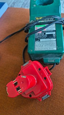 Charger with battery. Both working