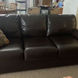Ashley brand 8 Foot Brown Leather Couch, Like New
