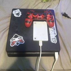 ps4 with controller and 1tb extra hard drive 