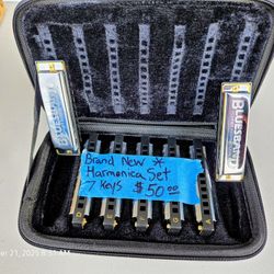 Brand new harmonica set