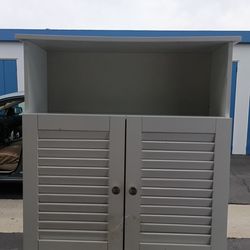 Small white cabinet with doors - wood