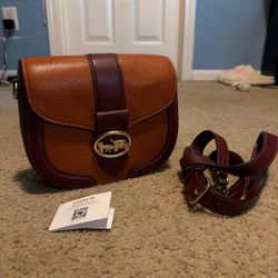 Coach brown and burgundy leather crossbody bag with gold hardware