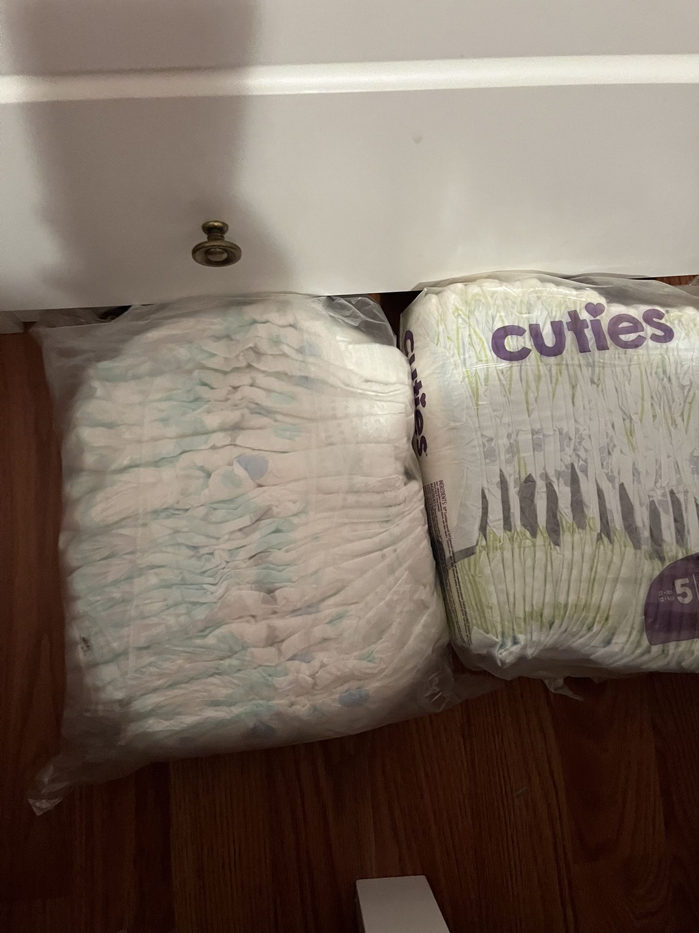 Up & Up Diapers, Size 6 and cuties size 5