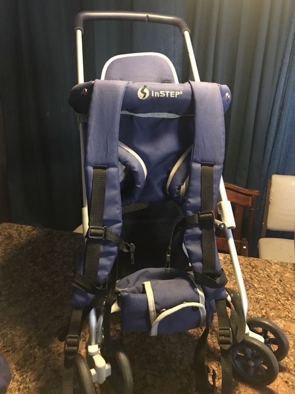 Instep backpack carrier/stroller
