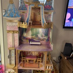 KidKraft Disney Princess Royal Celebration Wooden Castle Dollhouse