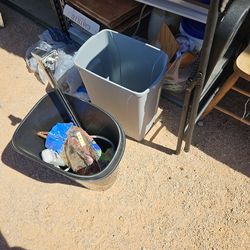 Two empty trash cans