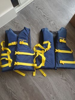 West Marine adult Universal Life Jackets – Set of 2