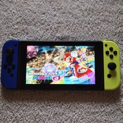 NINTENDO SWITCH with 50 POPULAR SWITCH GAMES 