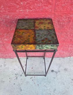 Tall and narrow tin end table, $20