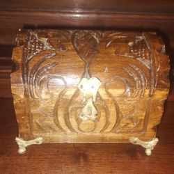 Hand carved red felt lined laquered wood chest