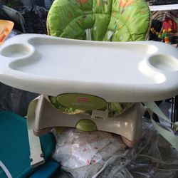 Like new adjustable reclining table top space saver high chair $25 firm