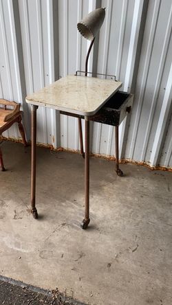 Antique desk with lamp and storage drawer