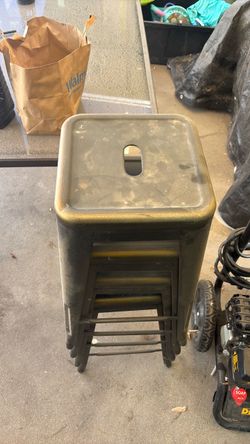 Black and gold metal stools