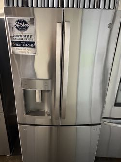 NEW OPEN BOX GE FRENCH STYLE REFRIGERATOR