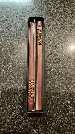 Two Brown With Gold Design Taper Palm Wax Candles