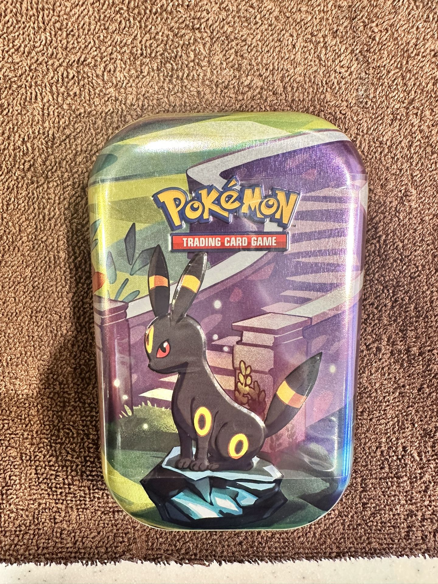 Pokemon Prismatic Evolutions Umbreon Mini Tin