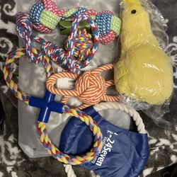 7 Pc Indestructible Dog Toys w/roll of waste bags 