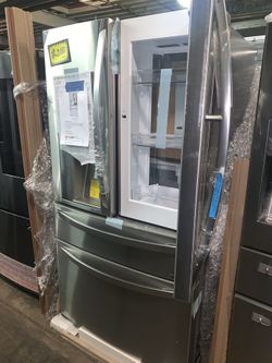 New LG 4-Door with instaview door-in-door refrigerator with 1yr. Warranty